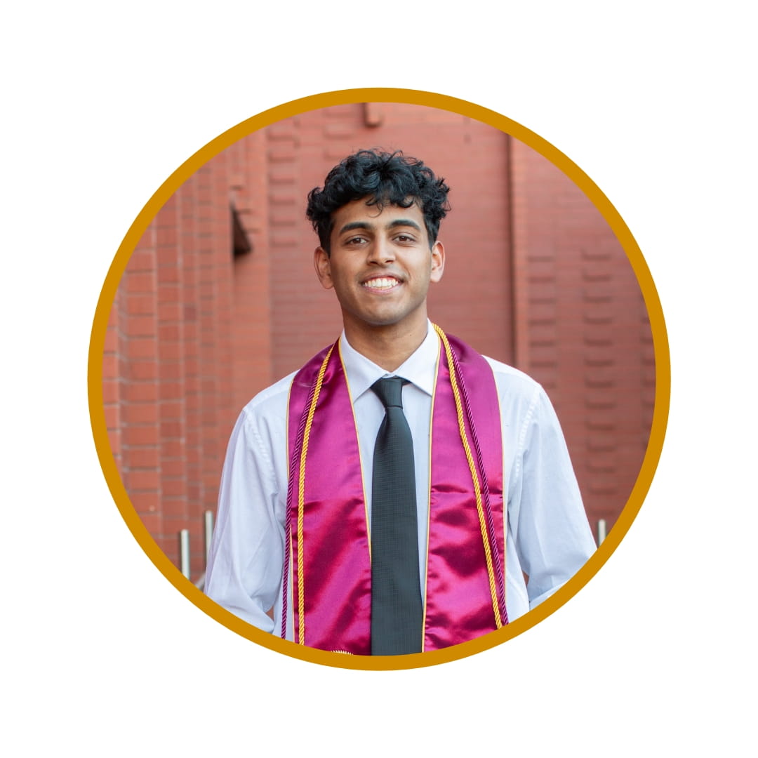 Picture of smiling dark-haired man wearing graduation regalia. The photo is bordered by a yellow circle. 